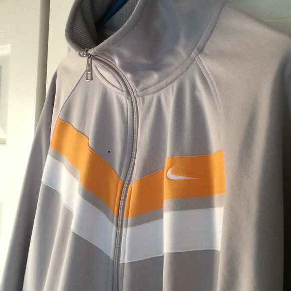 gold nike jumpsuit